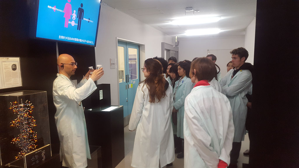 Dr Ramilowski giving a tour of the sequencing facilities